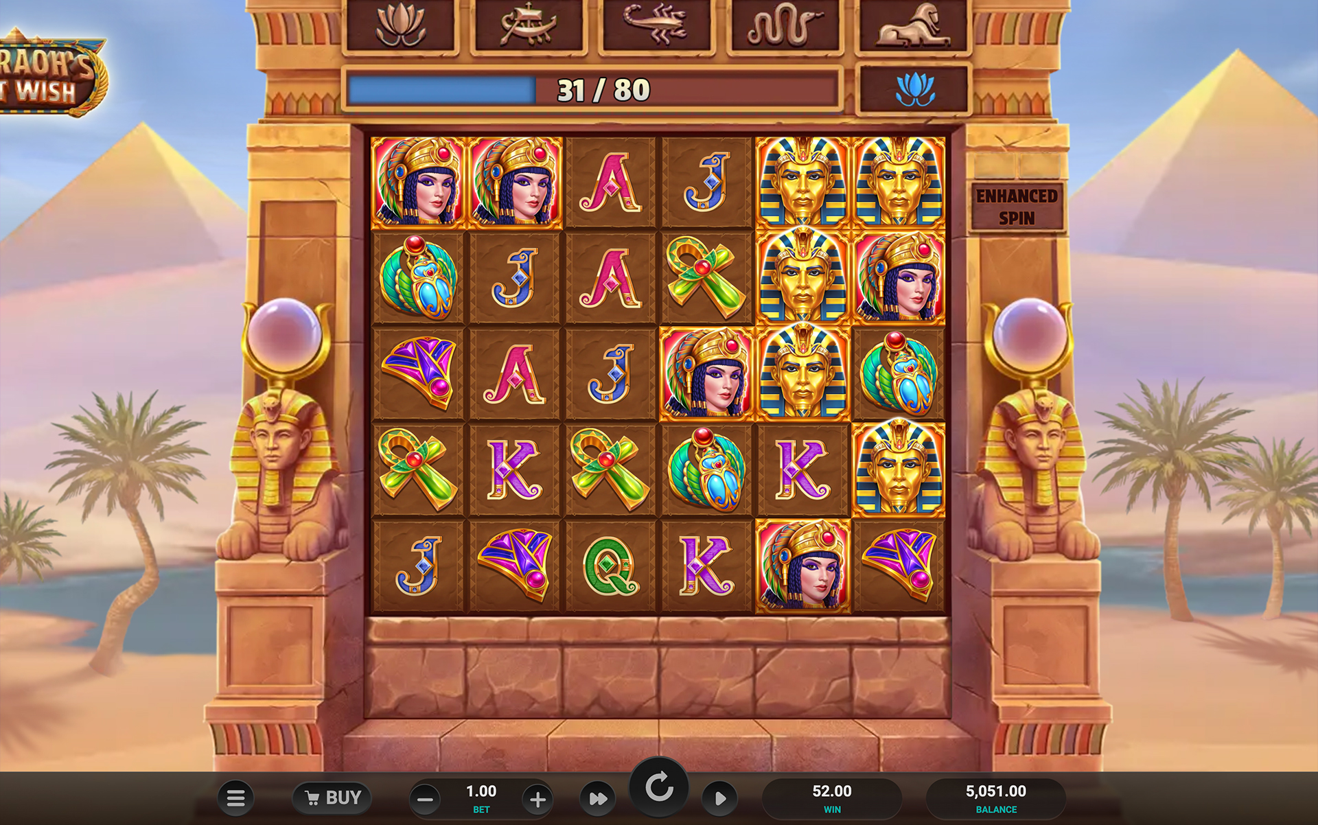 Grille 6x5 de Pharaoh's Last Wish avec la jauge de progression à 31 sur 80 et l'option Enhanced Spin active