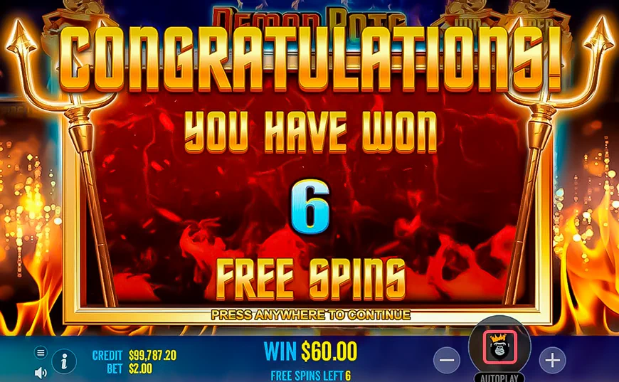 Écran de déclenchement des Free Spins sur Demon Pots avec wild collant sur les rouleaux 4 et 5