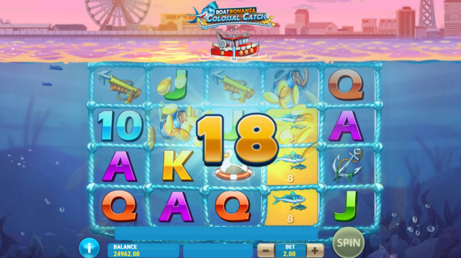 Capture en cours sur Boat Bonanza Colossal Catch avec une valeur de 18x affichée au centre de la grille sous marine
