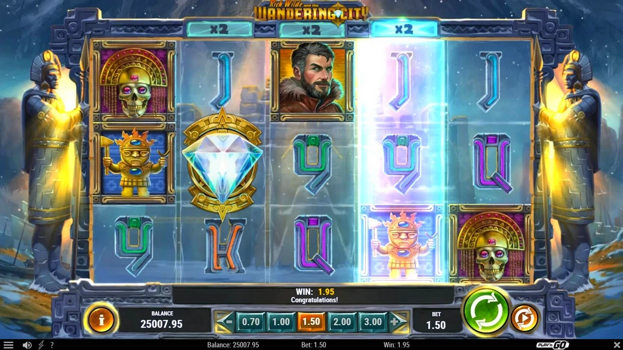 Grille 5x3 de Rich Wilde and the Wandering City avec le wild diamant central et deux multiplicateurs x2 actifs