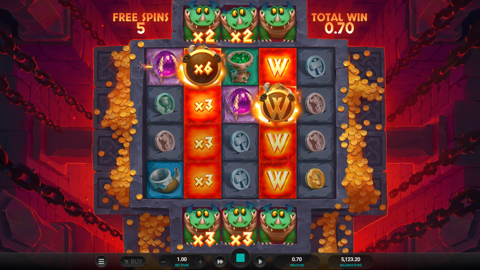 Écran de Fiery Free Spins sur Fang's Inferno Dream Drop avec colonnes de Wilds multipliés par 3