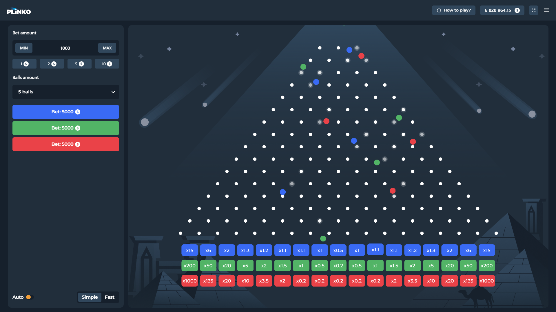 Multiball sur Plinko InOut, plusieurs billes bleues, vertes et rouges dévalant la grille en simultané