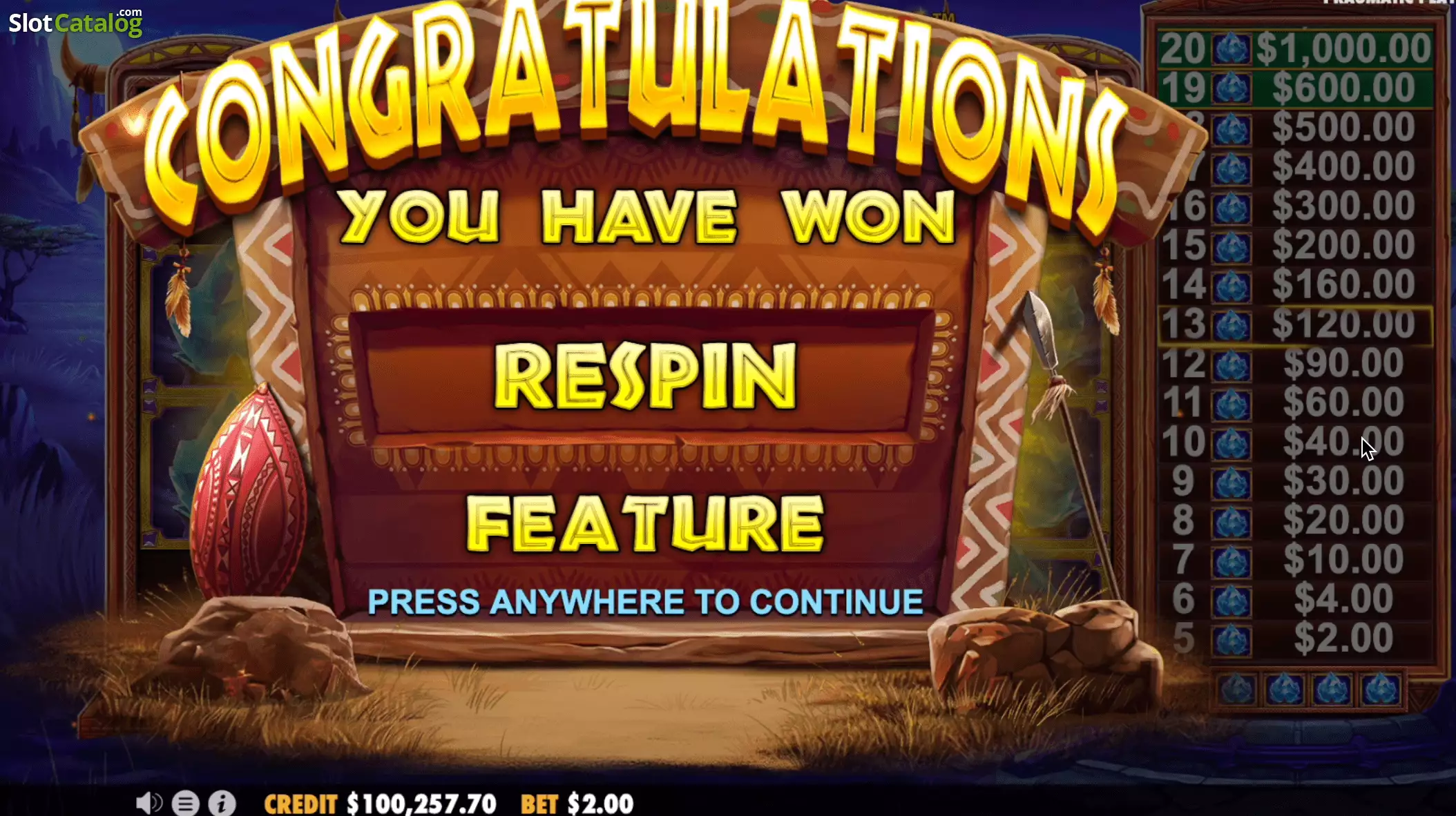 Tour de Respin Hold and Win sur Gems of Serengeti avec les pierres précieuses figées sur la grille