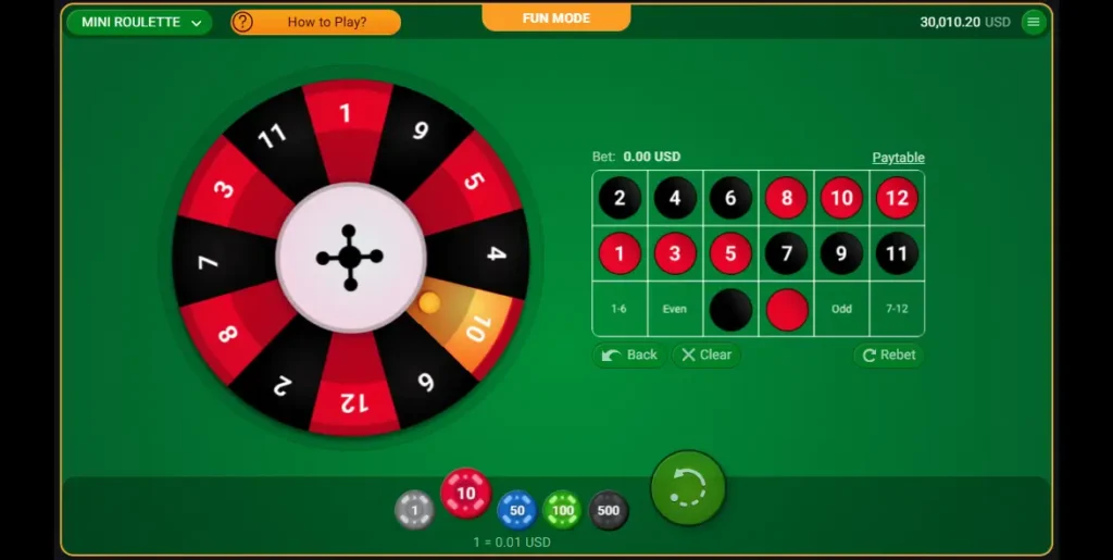 Table de jeu de Mini Roulette Spribe avec la roue à 13 cases et le tapis de mise affichés